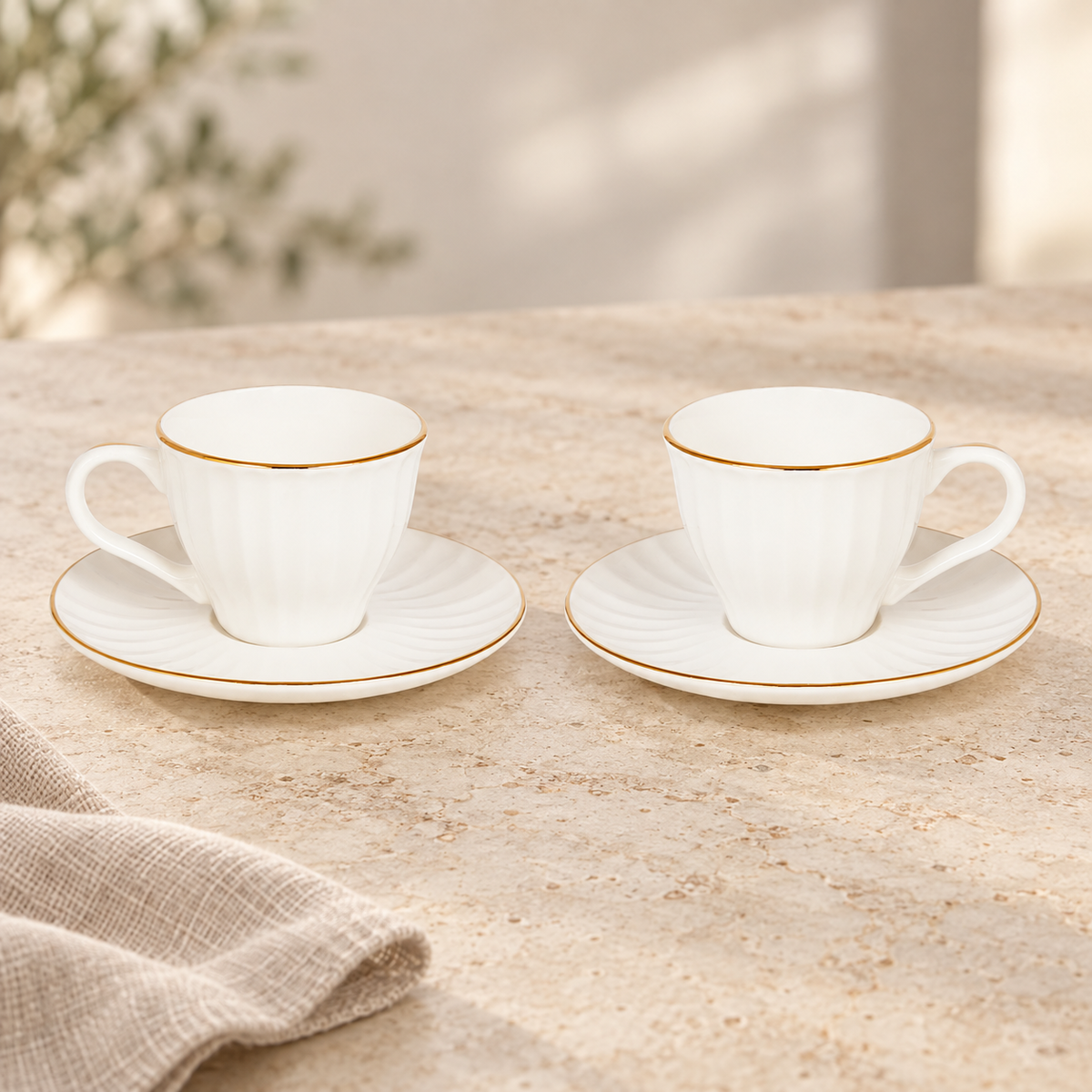 Acar SET820SA Charisma two-cup set with gold-tone rims — AI-assisted cafe table scene
